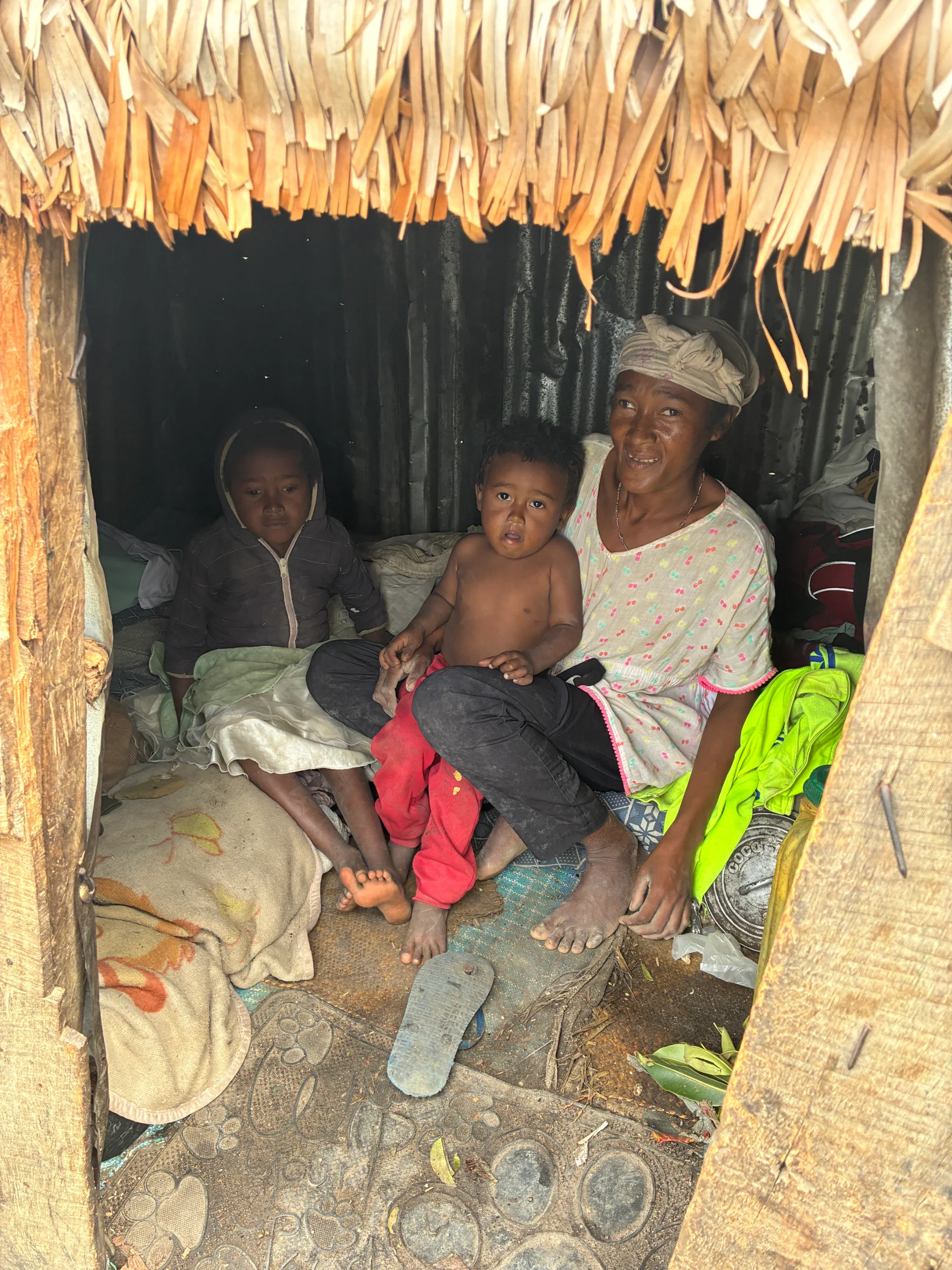 children within their house with the mother