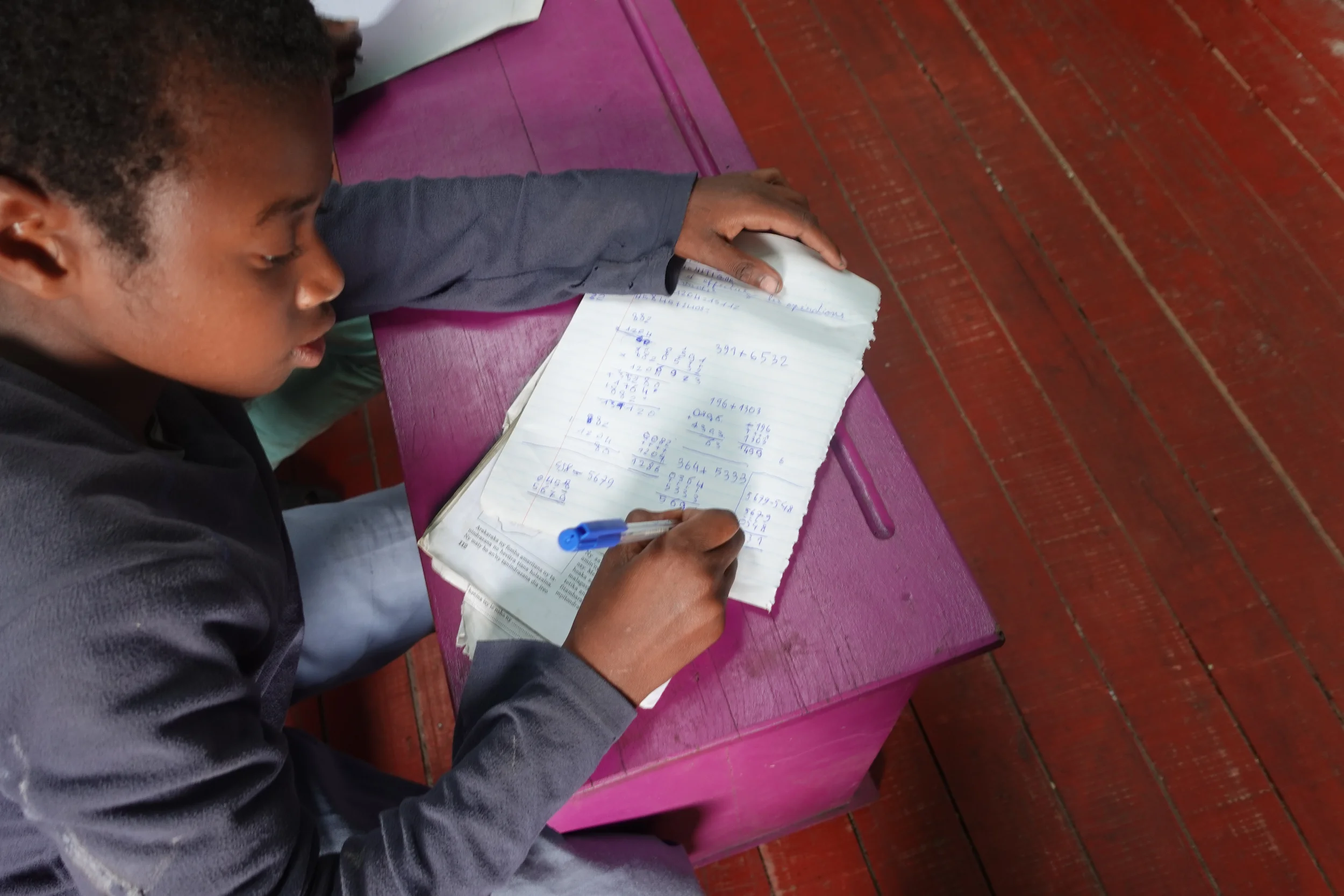 Children in Fort Dauphin doing their schoolwork